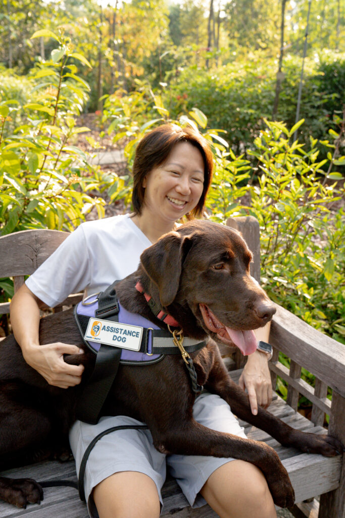 christine ho with service dog candidate