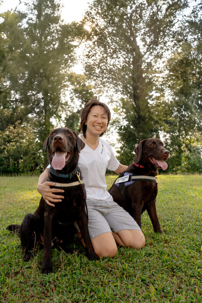 christine ho with two dogs